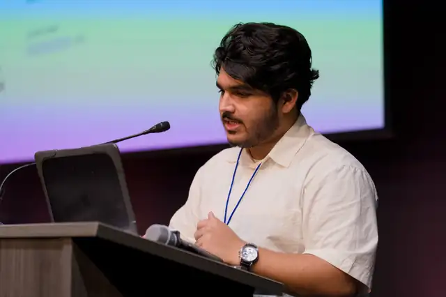 Rayyan Naik at the podium at the Niya Global Startup Summit 2026