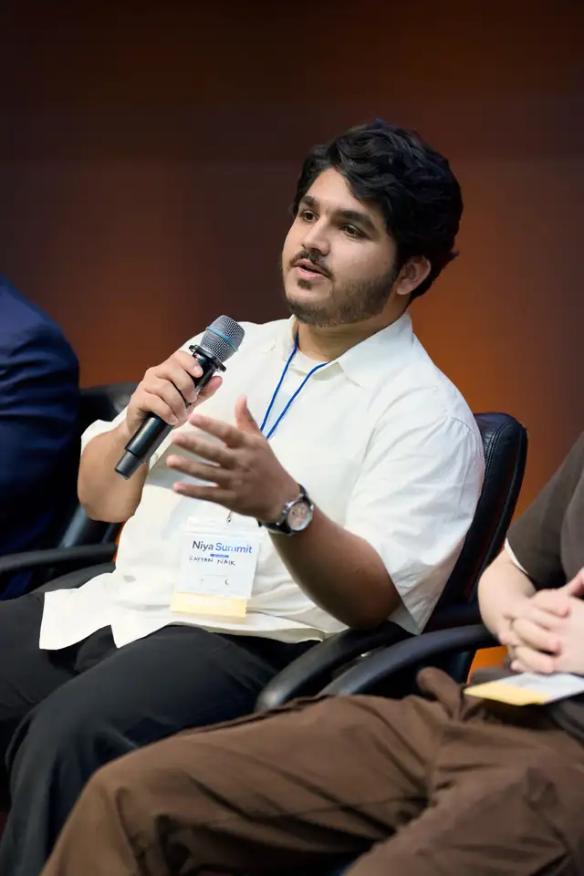 Rayyan Naik speaking at the Niya Global Startup Summit at the Computer History Museum, August 2026